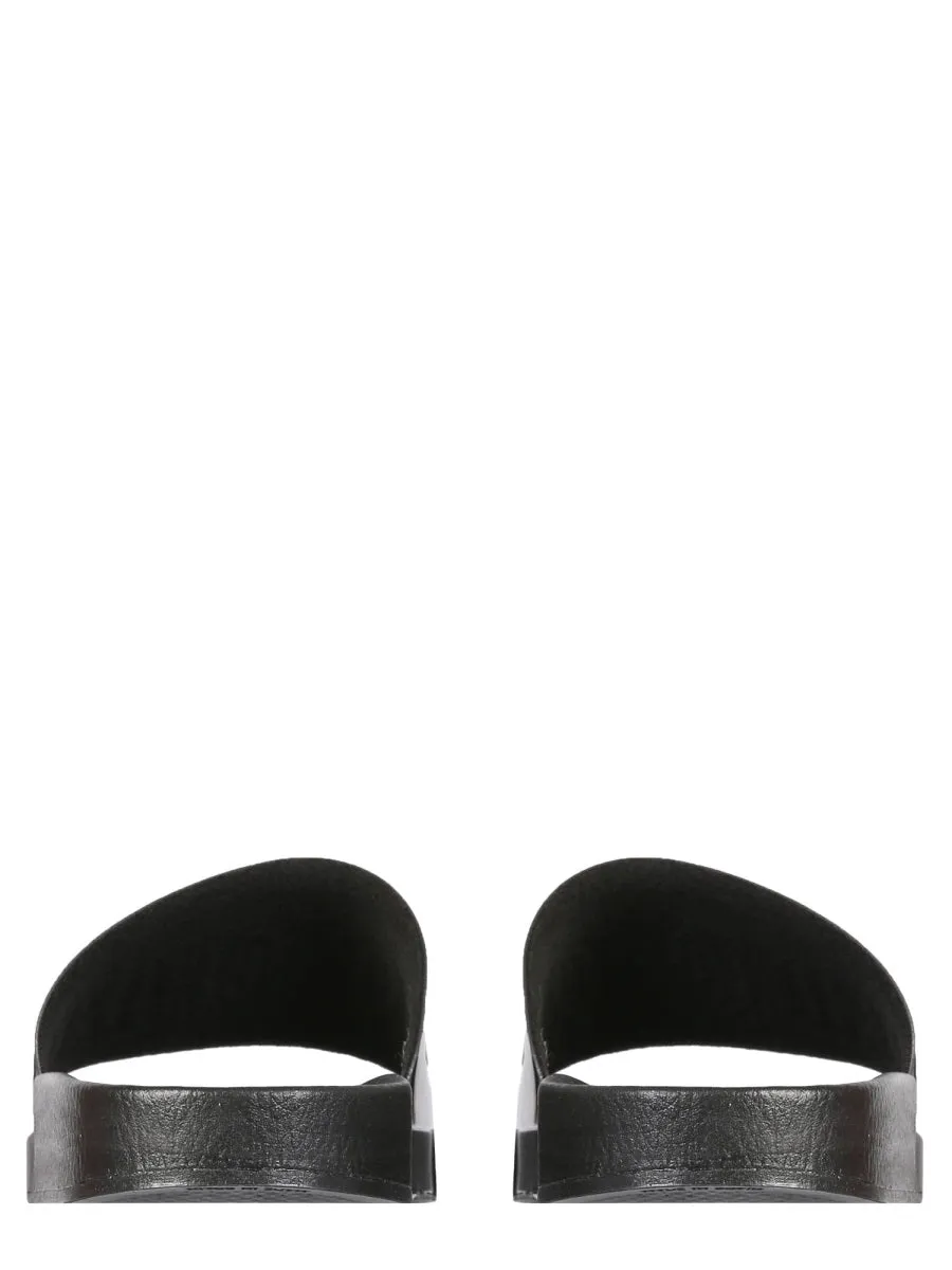 Moschino Logo Embossed Slides